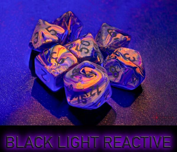 image of Chessex: Festive Mosaic/Yellow Polyhedral 7-Dice Set black light effect