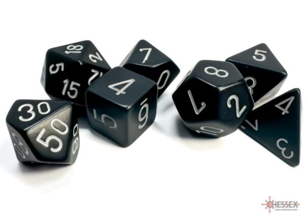 photo of Chessex: Opaque Black/White Polyhedral 7-Dice Set loose